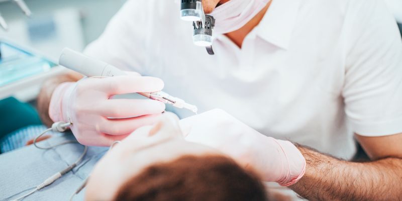 dentist working on a patient's mouth